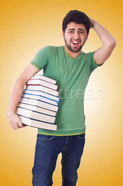 Student with lots of books on white Stock photo © Elnur