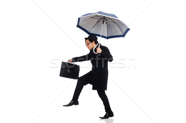 Young man holding suitcase and umbrella isolated on white Stock photo © Elnur
