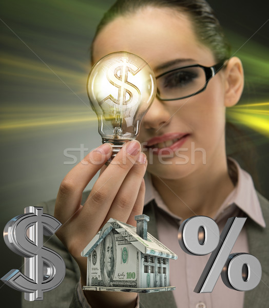 Jonge vrouw gloeilamp hypotheek business kantoor geld Stockfoto © Elnur