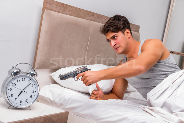 Mérges férfi fegyver óra kéz otthon Stock fotó © Elnur