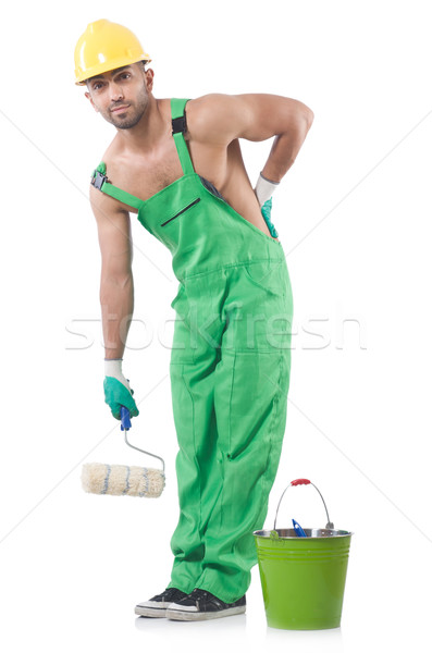 Painter in green coveralls on white Stock photo © Elnur