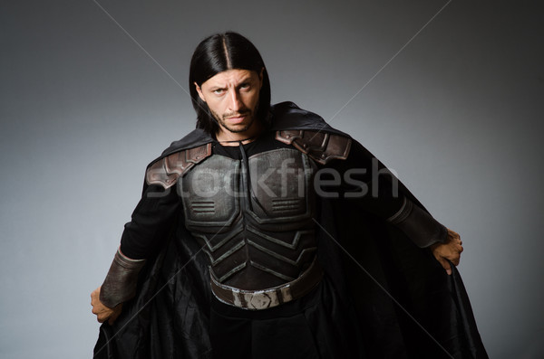Angry warrior against dark background Stock photo © Elnur