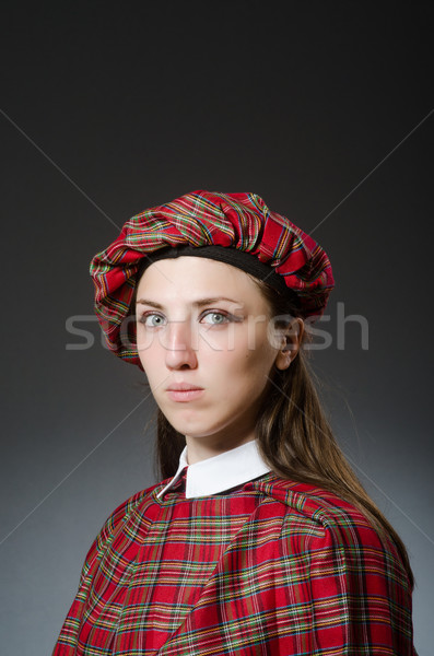 Woman wearing traditional scottish clothing Stock photo © Elnur