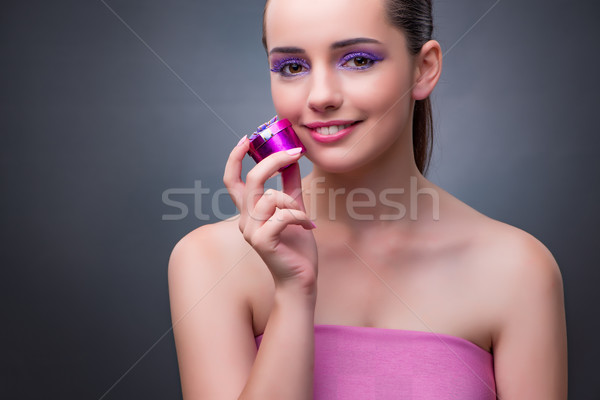 Stock photo: Young woman receiving small giftbox