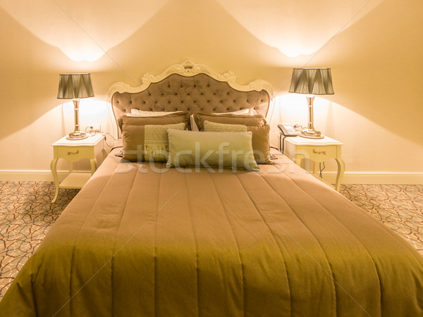 Modern hotel room with big bed Stock photo © Elnur