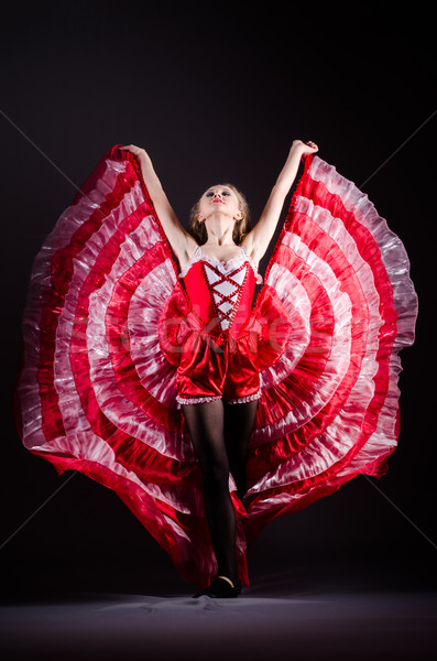 Młoda kobieta taniec czerwona sukienka muzyki sexy dance Zdjęcia stock © Elnur