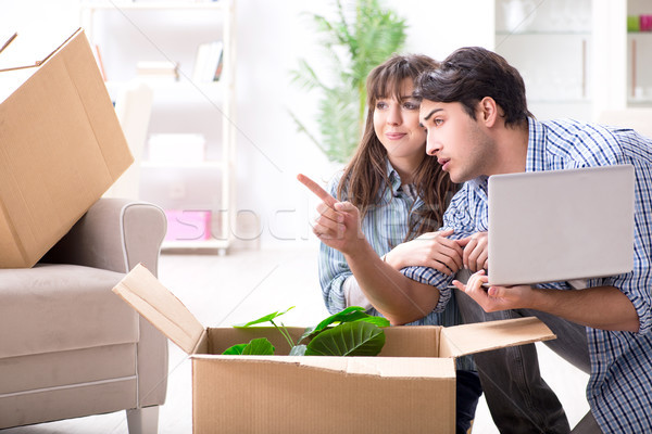 Young family moving in to new apartment after paying off mortgag Stock photo © Elnur