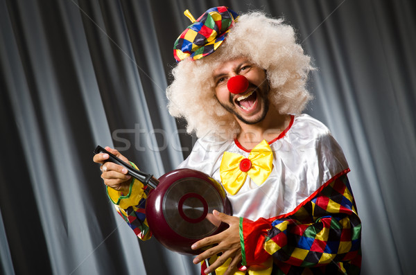 Angry clown with frying pan Stock photo © Elnur