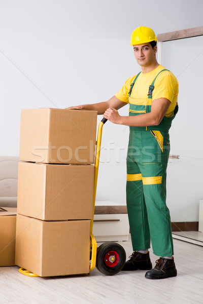 Man delivering boxes during house move Stock photo © Elnur