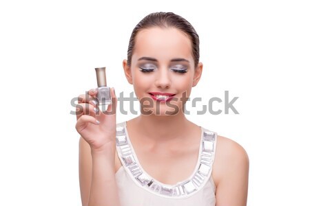 Woman with manicure tube isolated on white Stock photo © Elnur