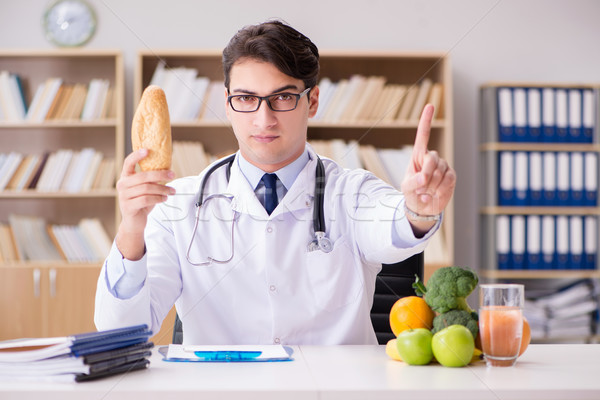 Doctor in dieting concept with fruits and vegetables Stock photo © Elnur