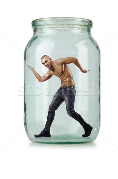 Muscular ripped man in glass jar Stock photo © Elnur