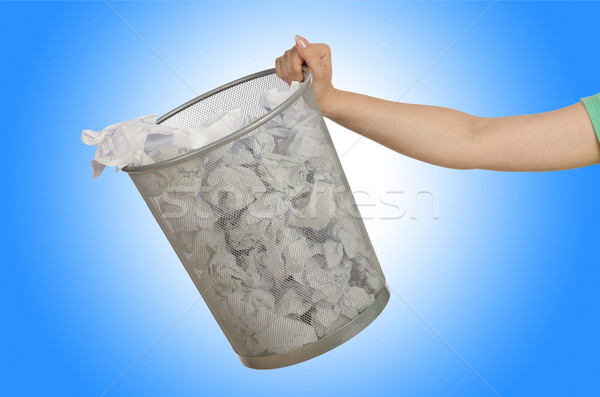 Stock photo: Hands with garbage bin with paper