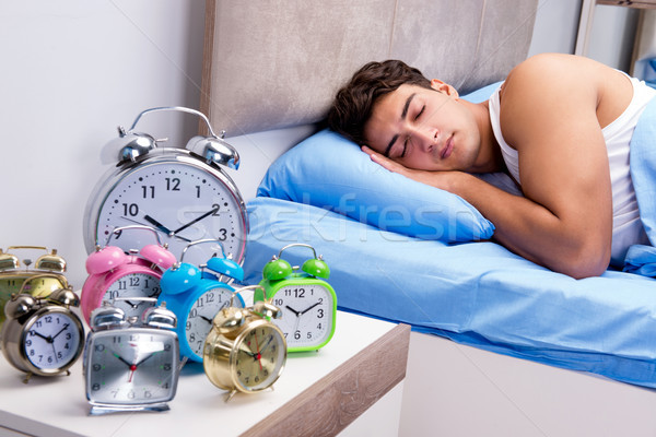 Man having trouble waking up in morning Stock photo © Elnur