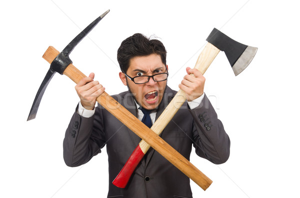 Young businessman holding a tool isolated on white Stock photo © Elnur