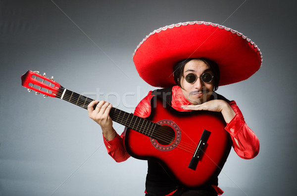 Mexican guitar player in red Stock photo © Elnur