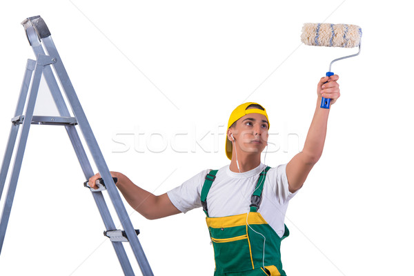 Young repairman painter climbing ladder isolated on white Stock photo © Elnur