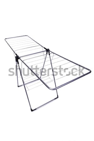 Collapsible clotheshorse isolated on the white background Stock photo © Elnur