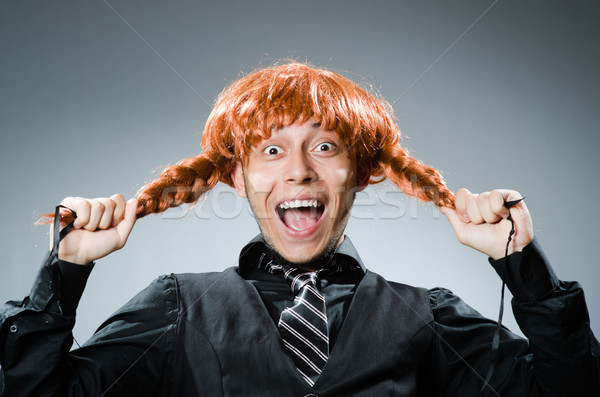 Vicces férfi vörös haj paróka üzlet üzletember Stock fotó © Elnur