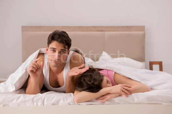 Stock photo: Family conflict with wife husband in bed