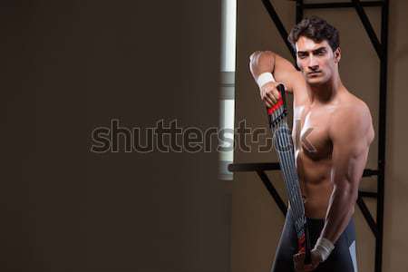 Muscular actor with mask against curtain Stock photo © Elnur