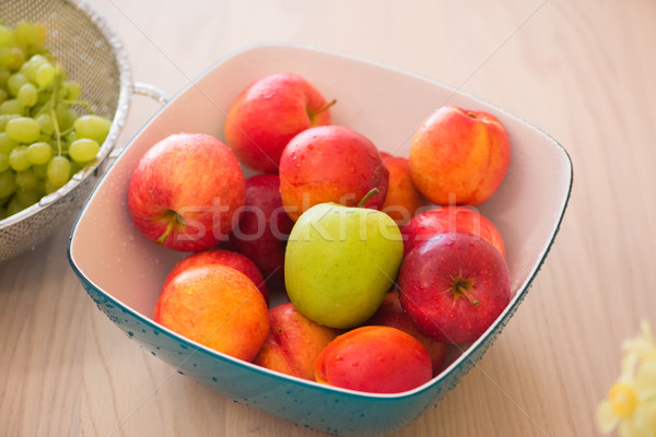 Stock photo: Fruits in the bown on table
