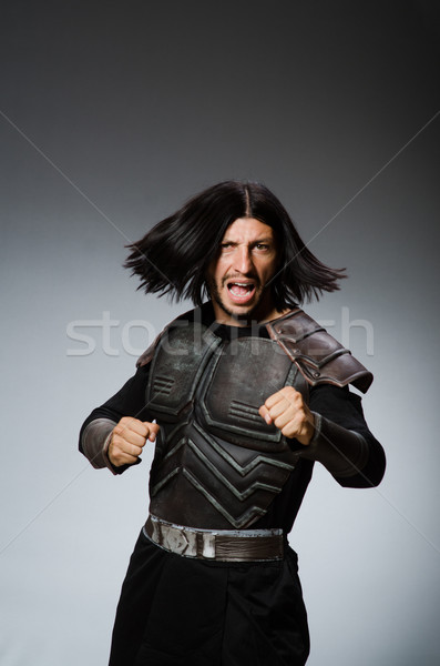Enojado guerrero oscuro hombre traje diversión Foto stock © Elnur