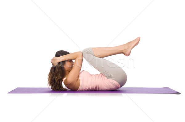 Young woman doing sport exercises isolated on white Stock photo © Elnur