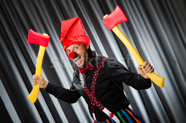 Funny clown with red axe Stock photo © Elnur