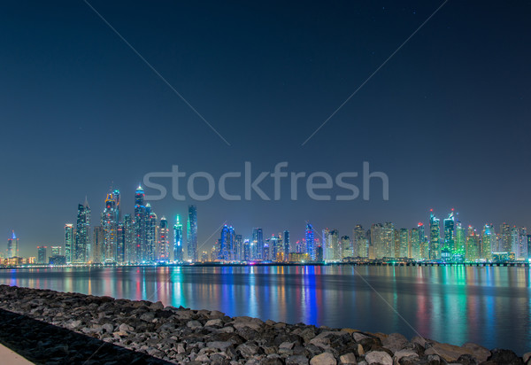 Dubai marina felhőkarcolók éjszaka iroda épület Stock fotó © Elnur