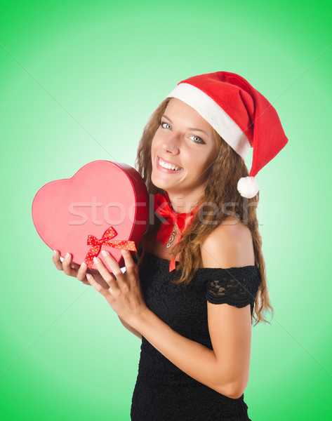 Young santa with giftbox on white Stock photo © Elnur