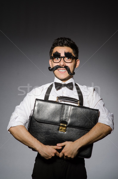Młody człowiek fałszywy wąsy przypadku odizolowany Zdjęcia stock © Elnur