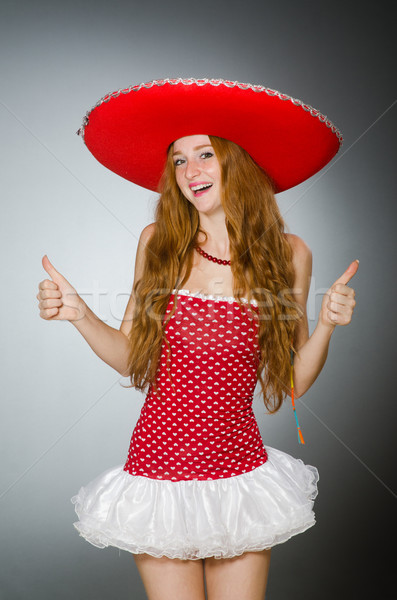 Mexican woman wearing sombrero hat Stock photo © Elnur