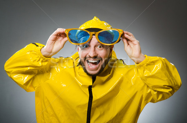 Férfi visel citromsárga öltöny vicces tánc Stock fotó © Elnur