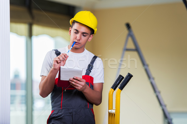 Man taking notes for delivery of boxes Stock photo © Elnur