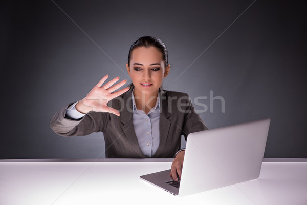 Businesswoman with laptop in business concept Stock photo © Elnur