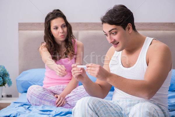 Young family with pregnancy test results Stock photo © Elnur