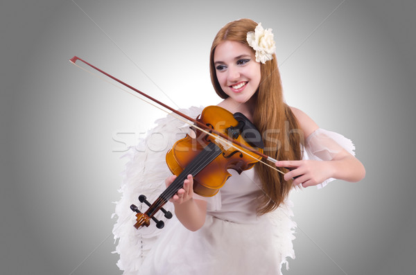 Young violin player isolated on white Stock photo © Elnur