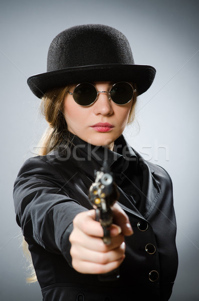 [[stock_photo]]: Homme · espion · arme · gris · affaires · fusil