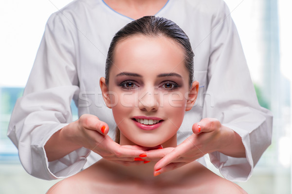 Young woman during face and skin massage session Stock photo © Elnur
