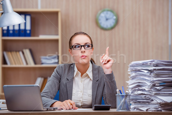 The busy stressful woman secretary under stress in the office Stock photo © Elnur