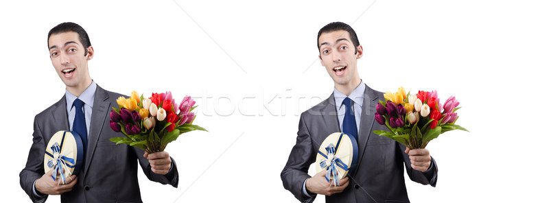 The businessman with giftbox and flowers Stock photo © Elnur
