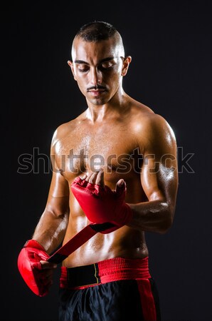 Man with sword and face paint Stock photo © Elnur