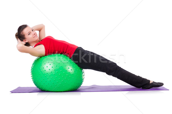 Young woman exercising with swiss ball Stock photo © Elnur