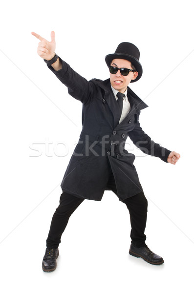 Stock photo: Young detective in black coat isolated on white
