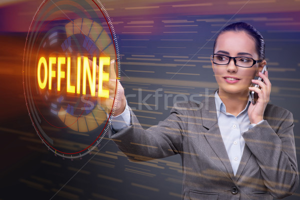 Businesswoman pressing virtual button offline Stock photo © Elnur