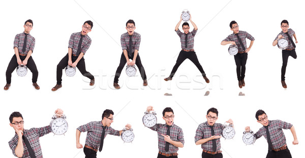Stock photo: Young man with clock isolated on white