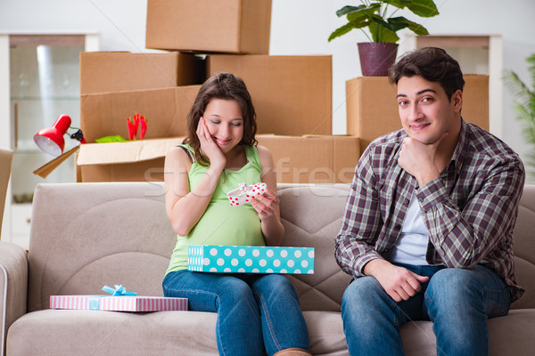 Young couple of man and pregnant wife with giftbox Stock photo © Elnur