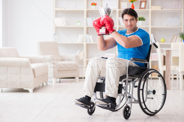Disabled boxer at wheelchair recovering from injury Stock photo © Elnur