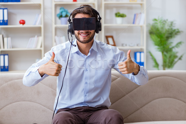 Student gamer playing games at home Stock photo © Elnur